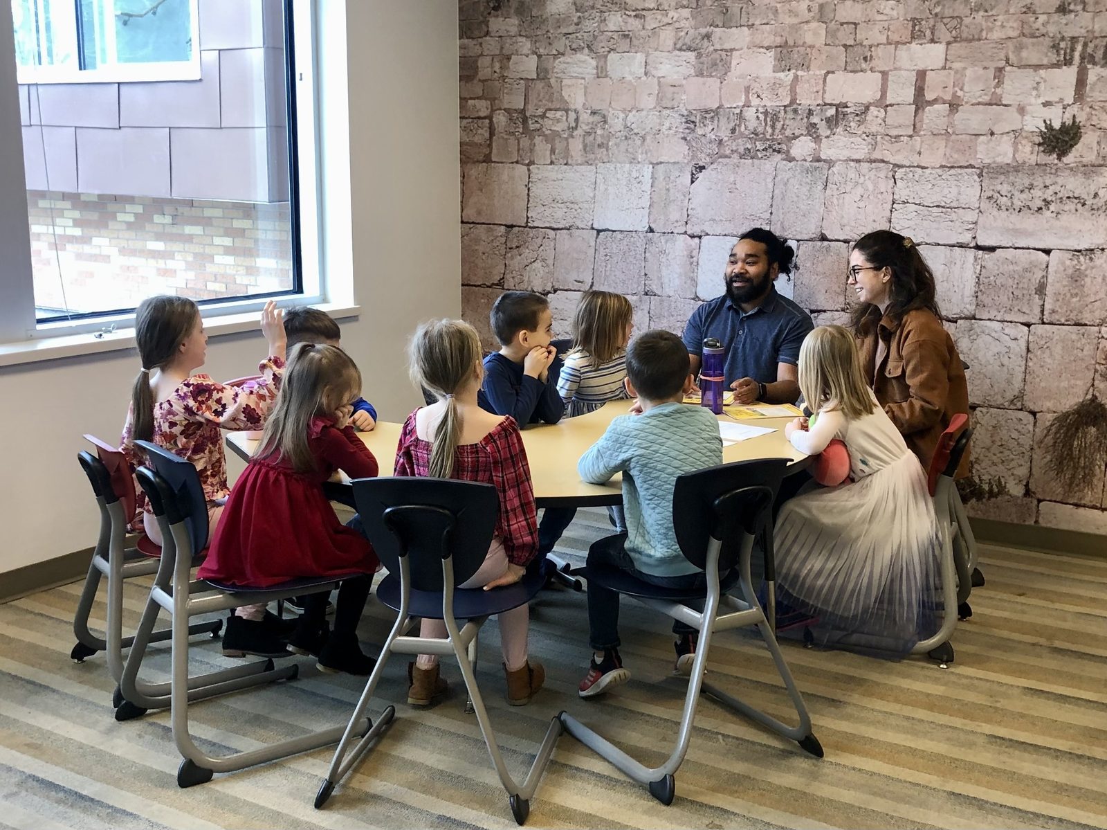 Res Pres Kids gathered around a table
